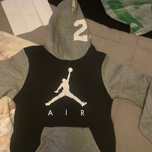 Black gray & white writing Jordan/nike children med hoodie